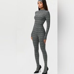 NAKED PRINT CLOSED TOE JUMPSUIT